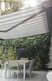 Opal awning extended over patio in Canberra
